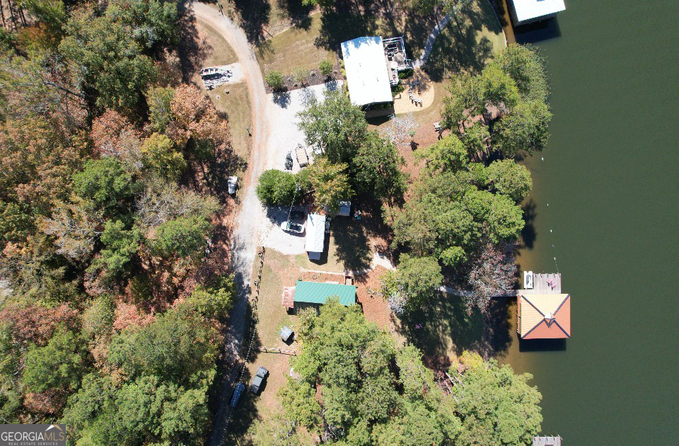 955 Barbara Point Road Sparta, GA 31087 - Photo 45 of 54 an aerial view of a house with a yard