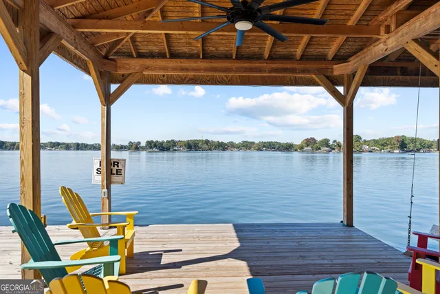 a view of a house with a yard patio and backyard