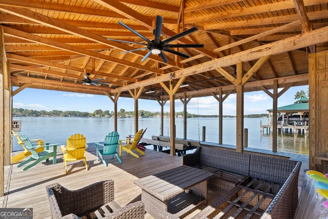 a view of a house with a yard and roof