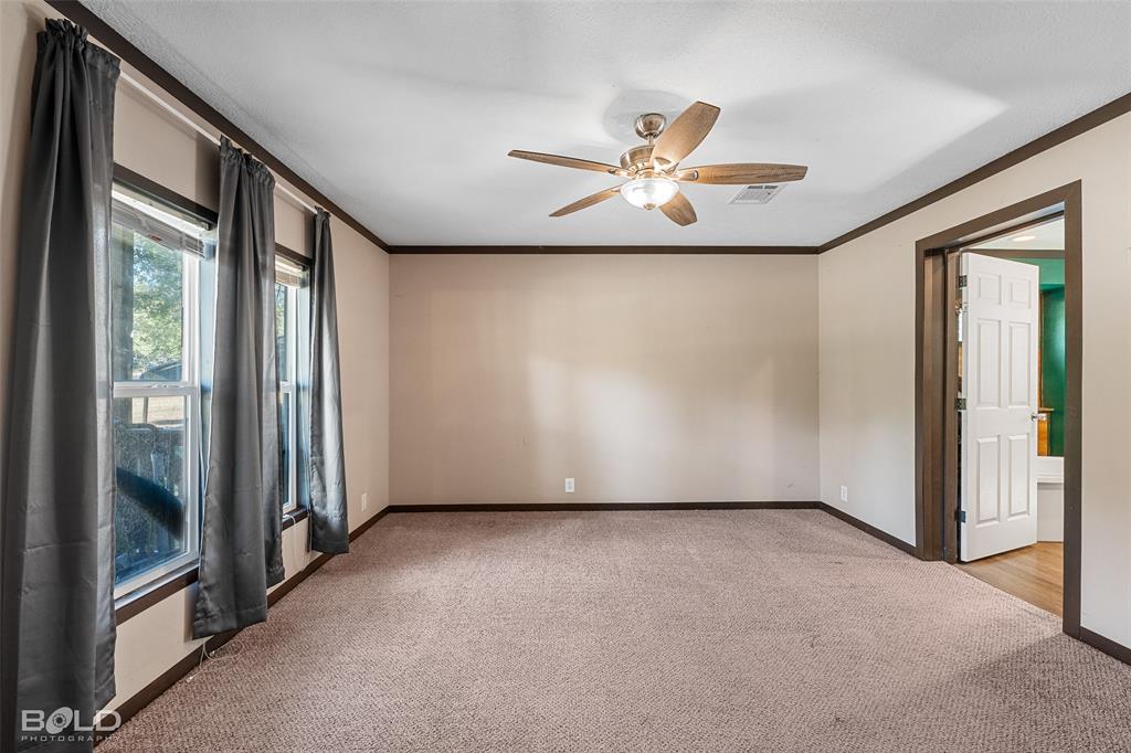 9489 Capps City Road Rodessa, LA 71069 - Photo 24 of 34 an empty room with windows