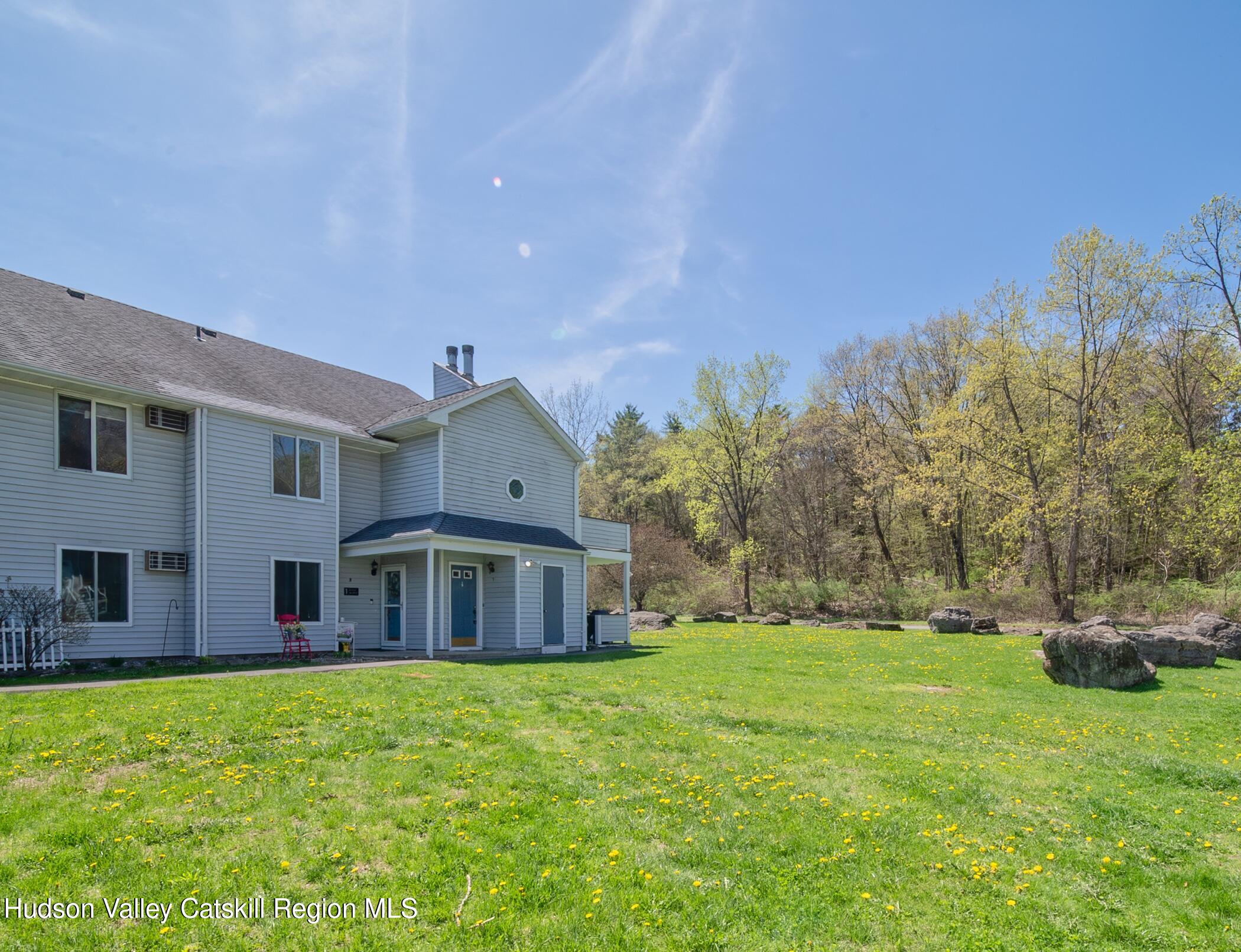 a front view of house with yard