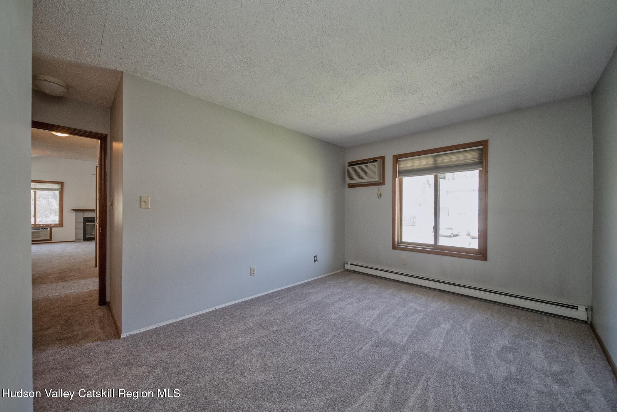 9 Rock Maple Road Saugerties, NY 12477 - Photo 21 of 30 a view of an empty room with a window