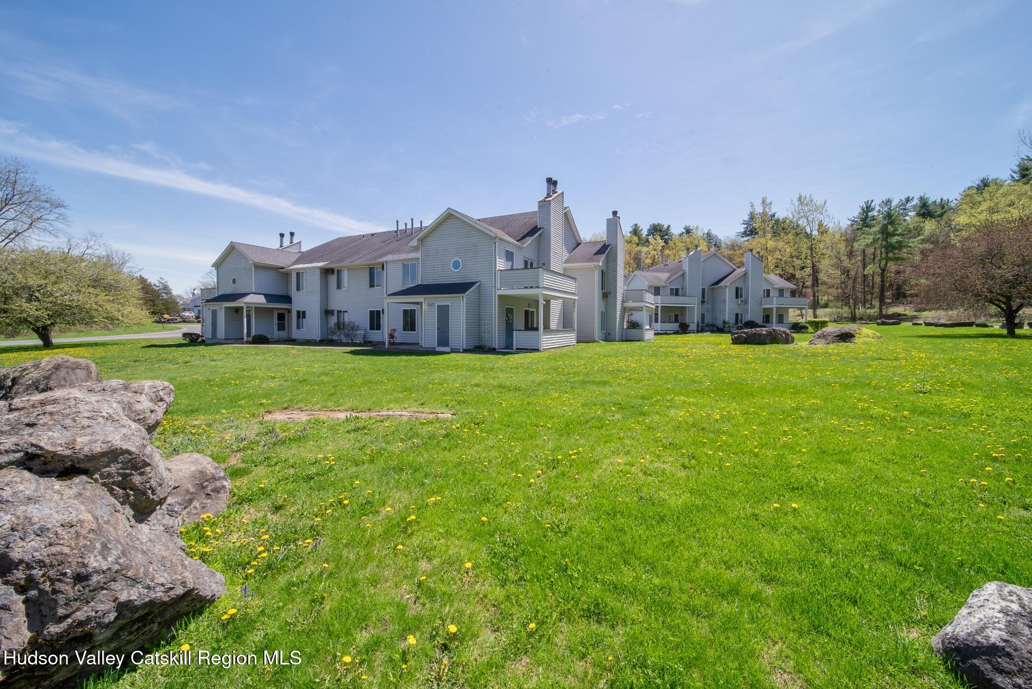 9 Rock Maple Road Saugerties, NY 12477 - Photo 29 of 30 a view of a big house with a big yard and large trees