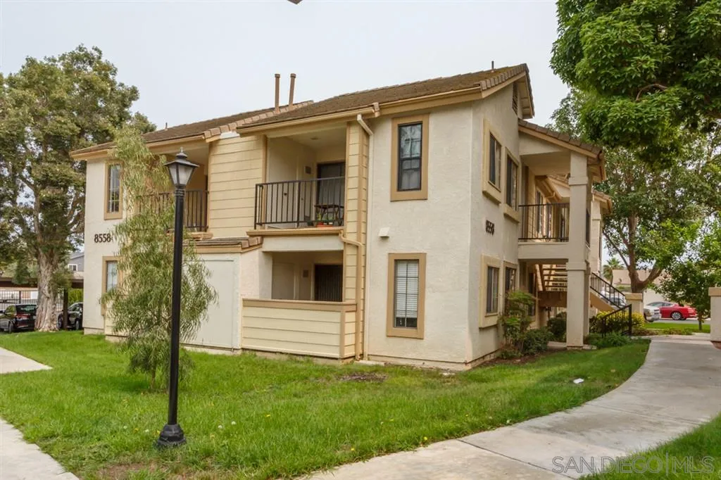 8558 Summerdale Road, Unit 133 San Diego, CA 92126 - Photo 1 of 14 a view of a house with a yard