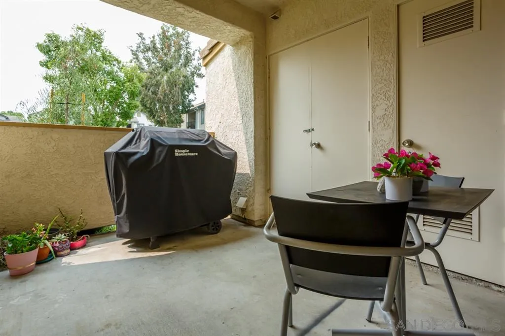 8558 Summerdale Road, Unit 133 San Diego, CA 92126 - Photo 10 of 14 a room with a table and chairs