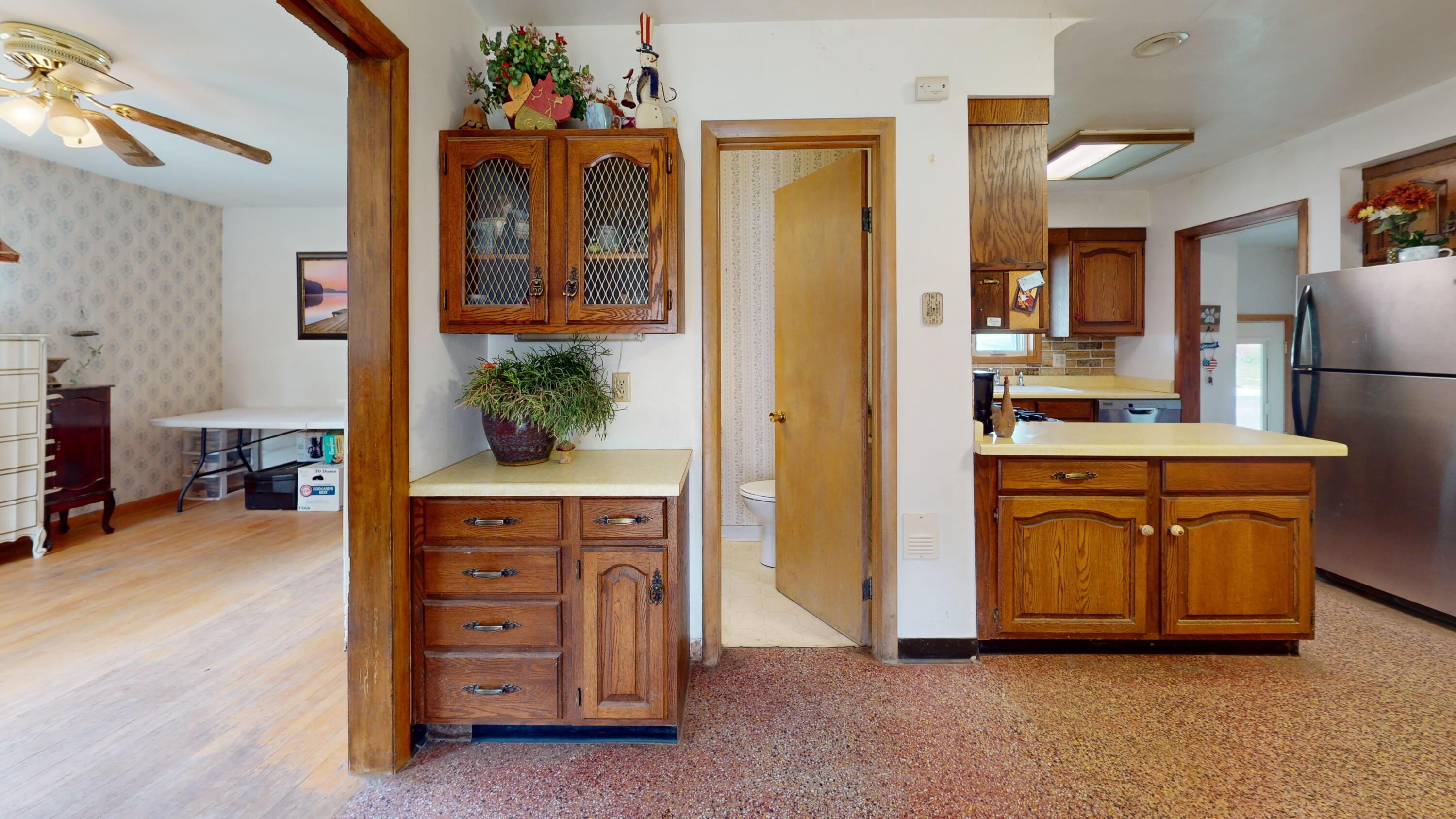 2402 South 9th Street Manitowoc, WI 54220 - Photo 11 of 29 Kitchen from Sunroom