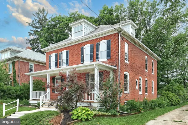 front view of house with a yard