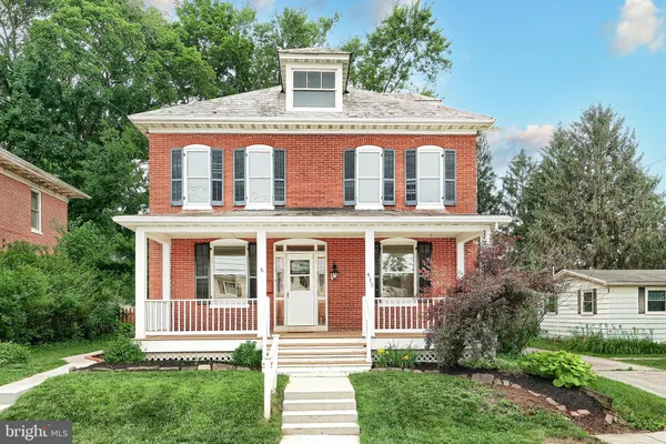 a sign that is on the side of a building