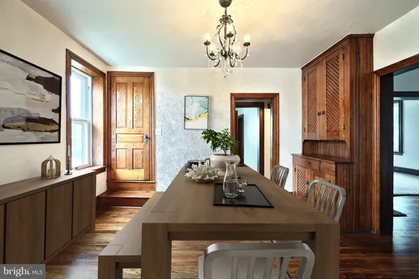a kitchen with stainless steel appliances a refrigerator sink and cabinets