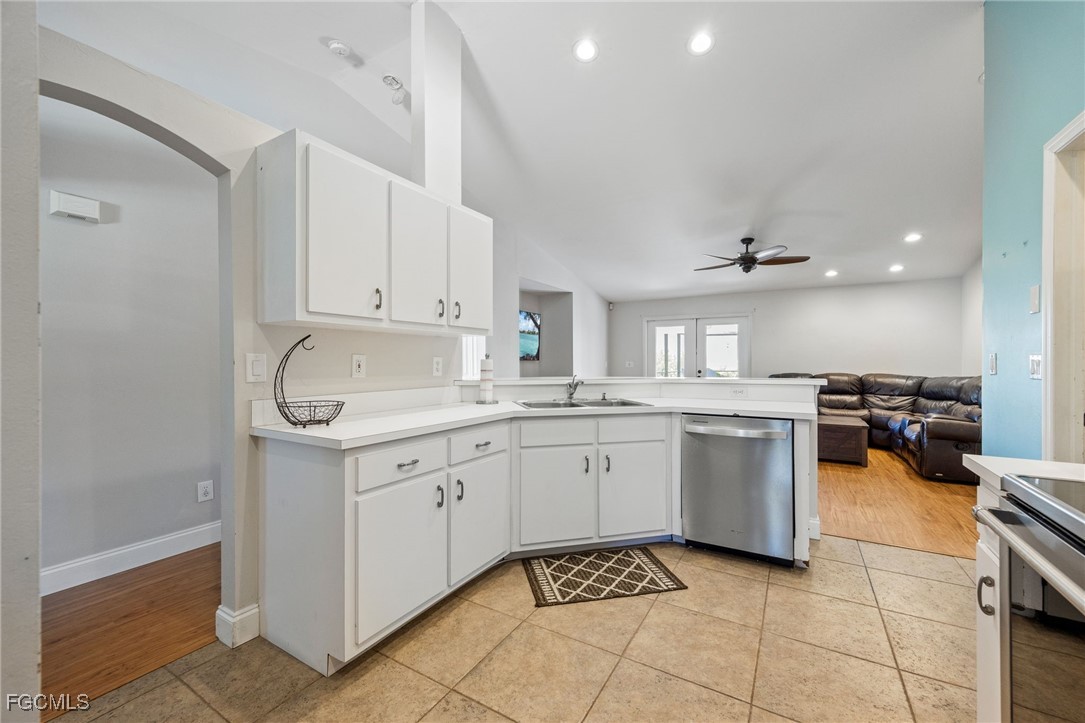 14150 Benedict Street Fort Myers, FL 33905 - Photo 13 of 31 a kitchen with a sink and cabinets