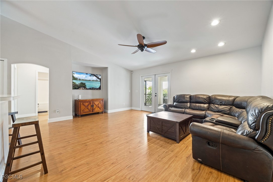 14150 Benedict Street Fort Myers, FL 33905 - Photo 17 of 31 a living room with furniture and wooden floor