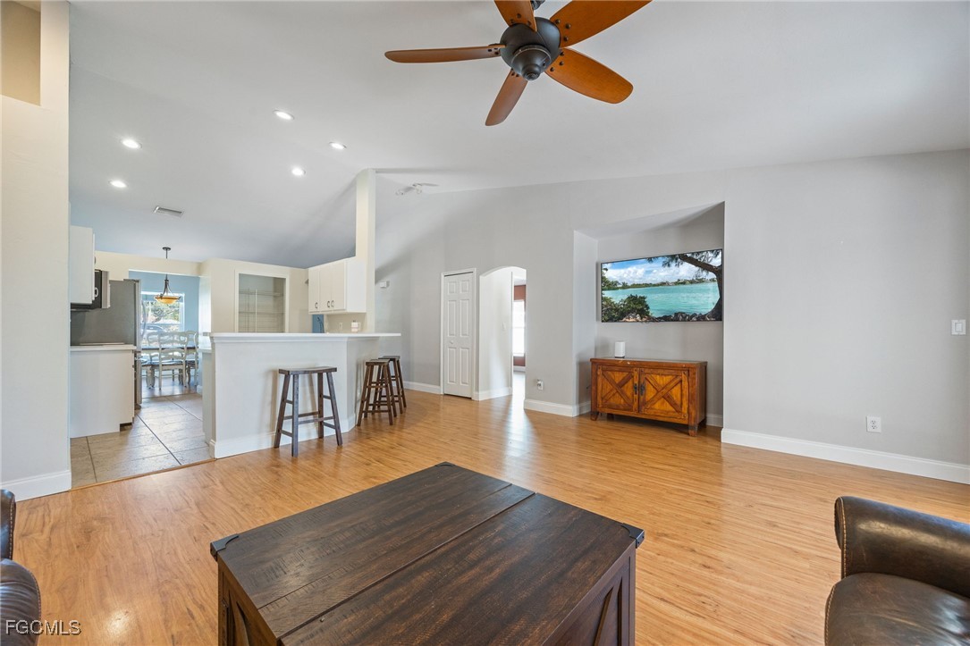 14150 Benedict Street Fort Myers, FL 33905 - Photo 20 of 31 a living room with furniture and a wooden floor