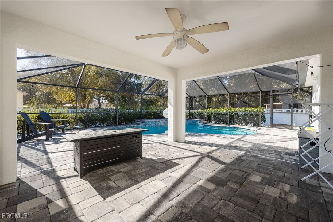 14150 Benedict Street Fort Myers, FL 33905 - Photo 27 of 31 a view of living room with a floor to ceiling window and outdoor view