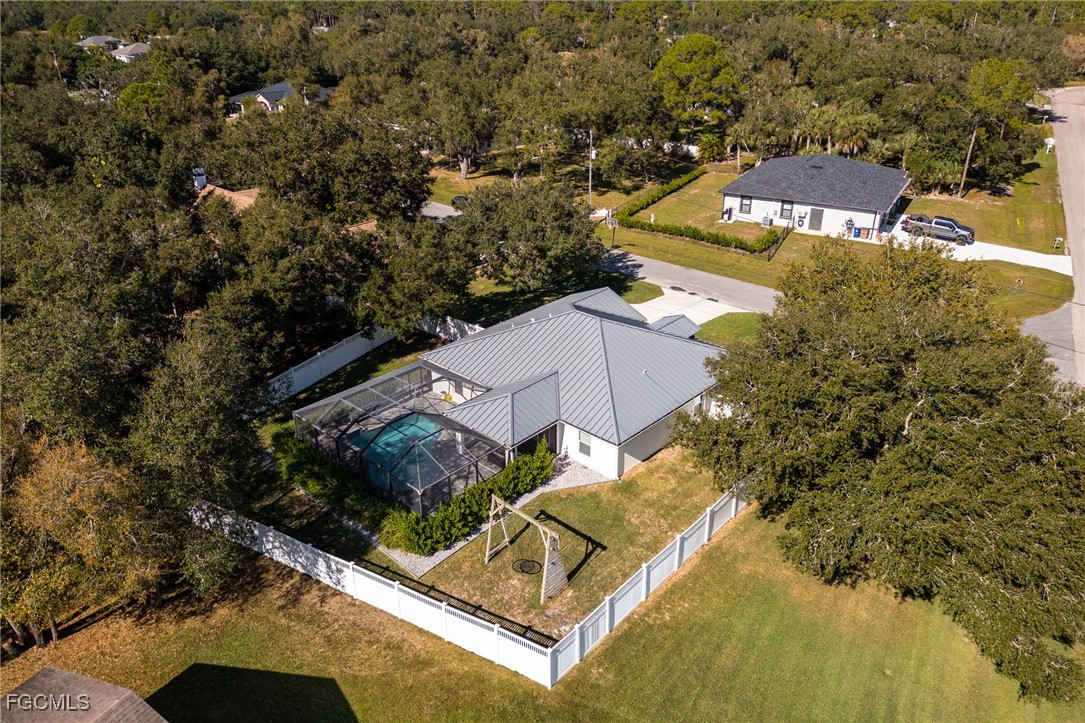14150 Benedict Street Fort Myers, FL 33905 - Photo 31 of 31 an aerial view of residential houses with outdoor space