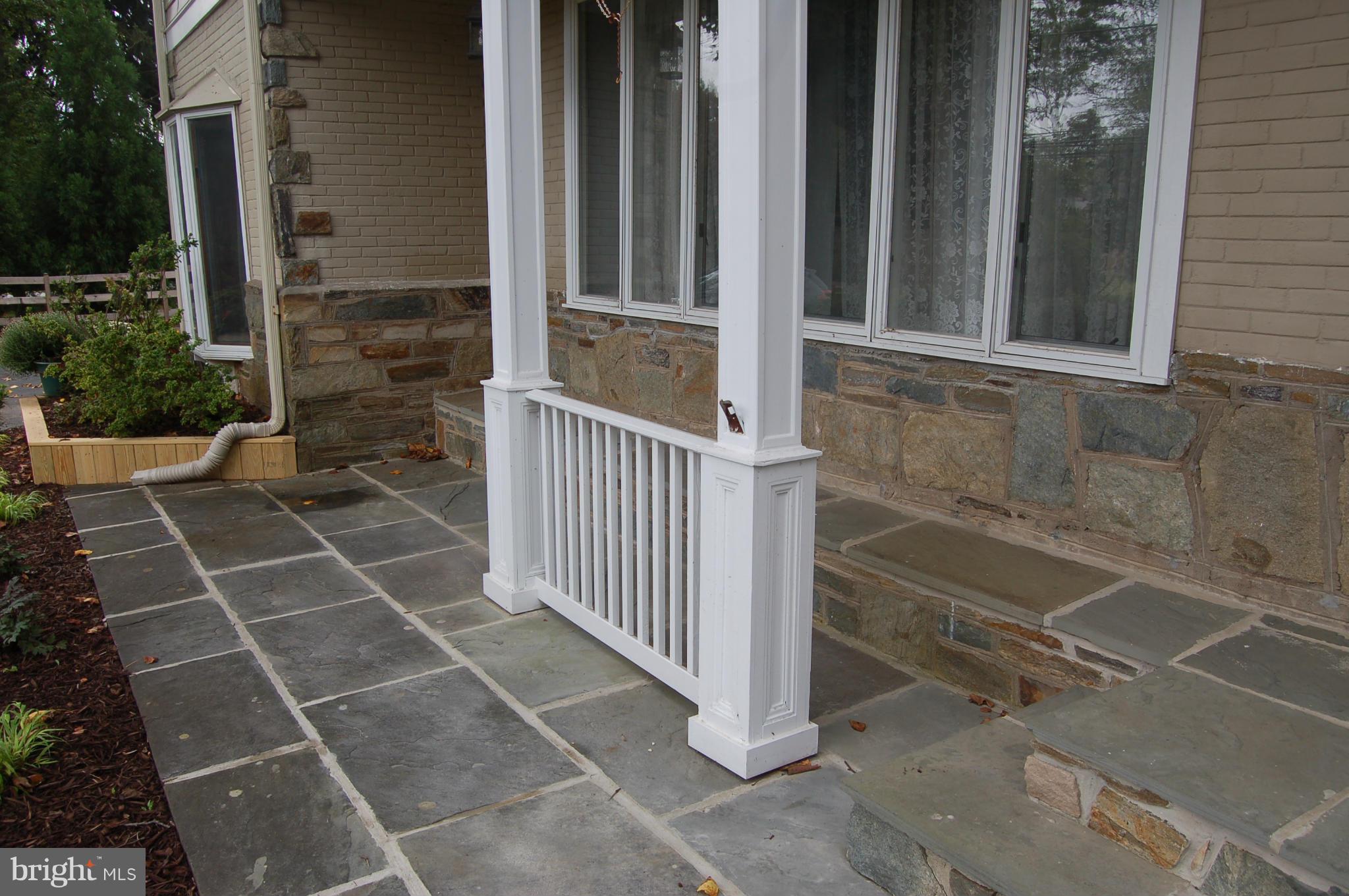 8712 Brickyard Road Potomac, MD 20854 - Photo 2 of 30 a view of a entrance door of the house