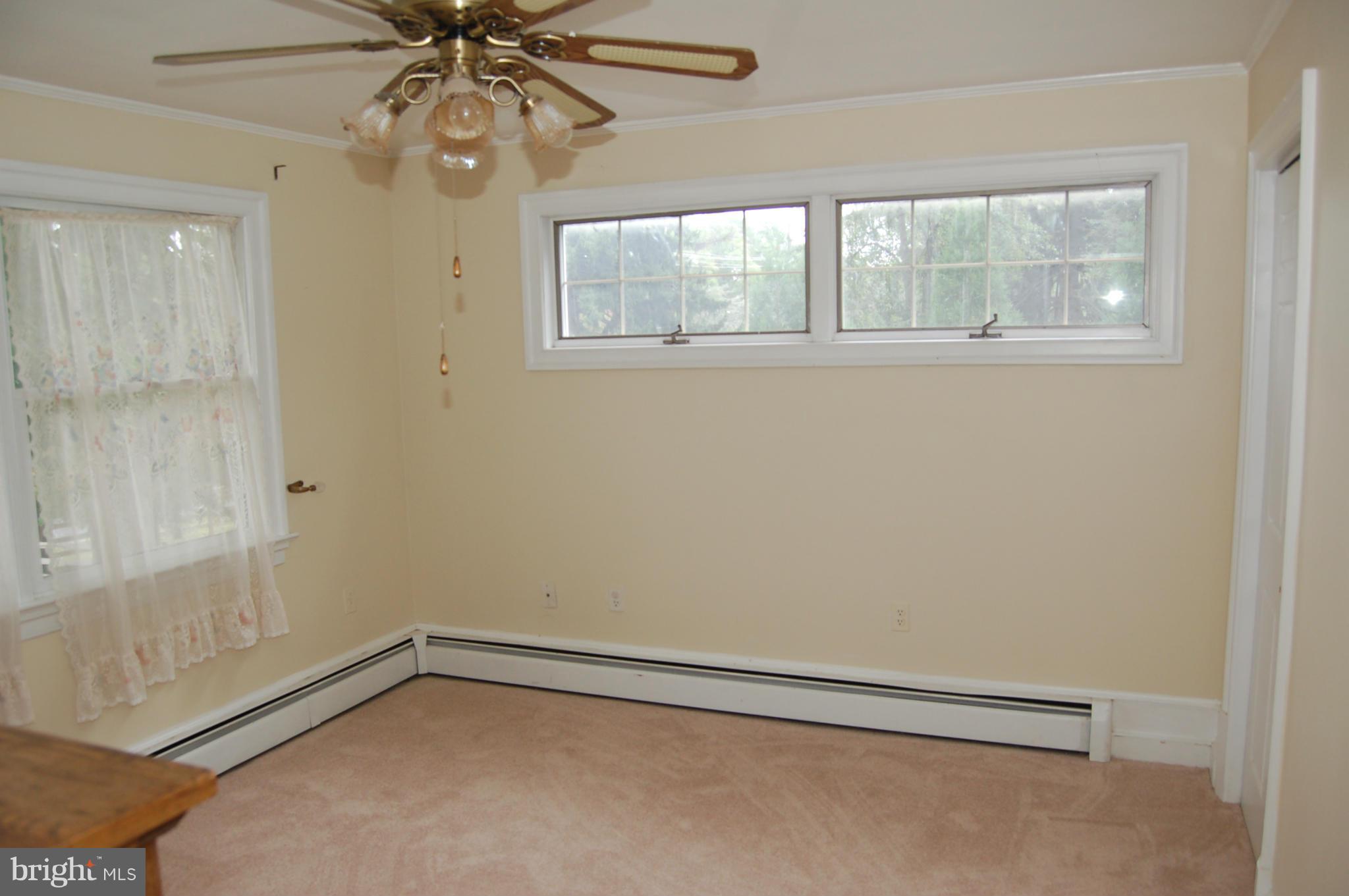 8712 Brickyard Road Potomac, MD 20854 - Photo 30 of 30 a view of an empty room with a window