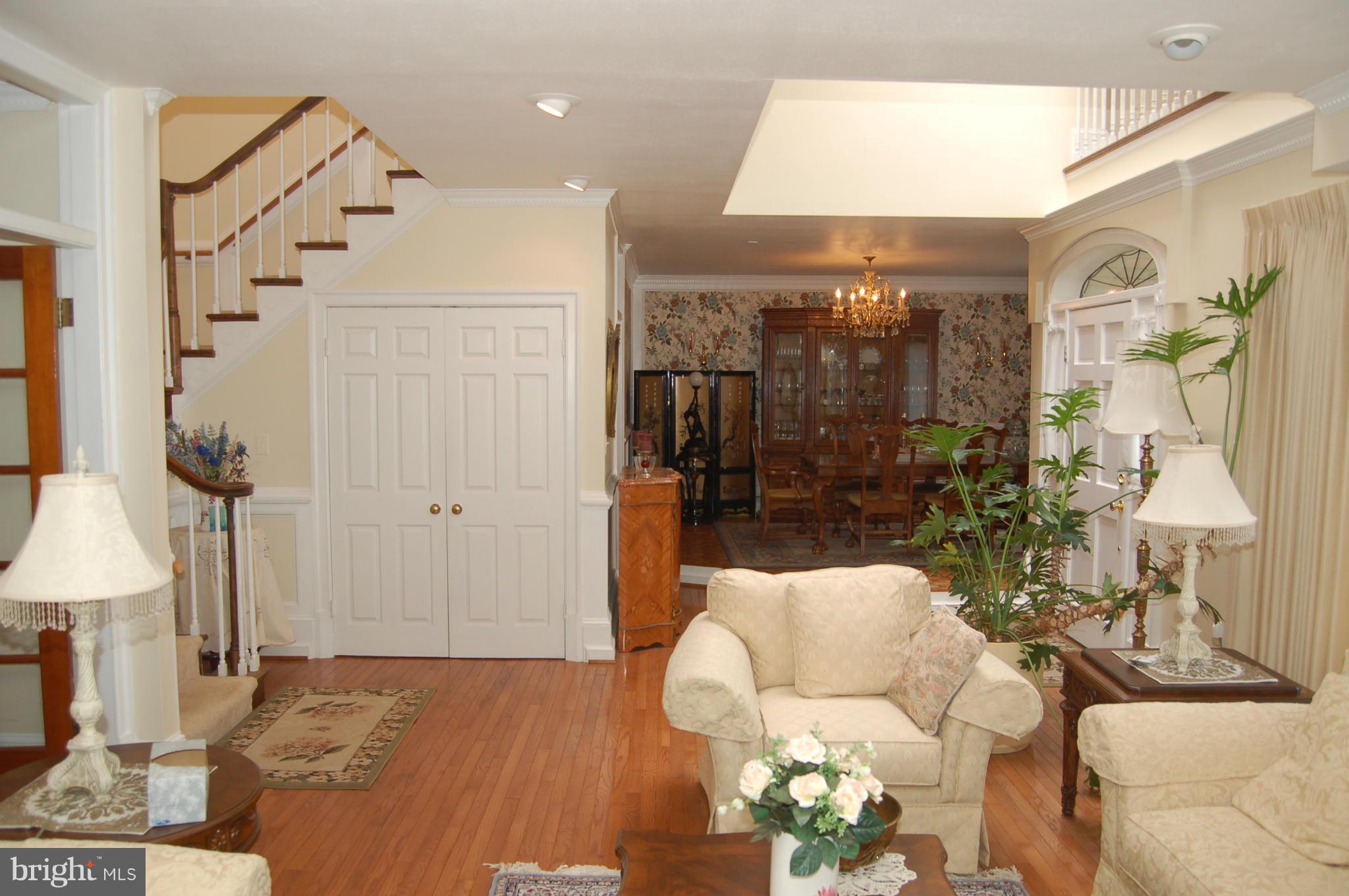 8712 Brickyard Road Potomac, MD 20854 - Photo 7 of 30 a living room with furniture