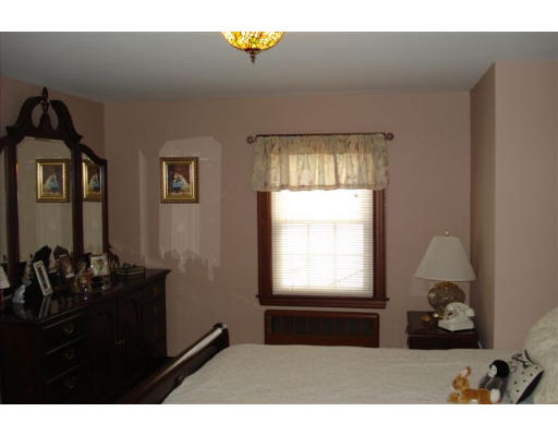 91 Thornton Road Waltham, MA 02453 - Photo 11 of 13 a living room with furniture and a window