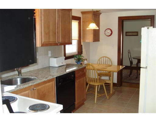 91 Thornton Road Waltham, MA 02453 - Photo 3 of 13 a kitchen with a sink cabinets and appliances