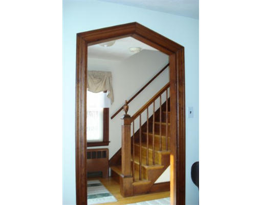 91 Thornton Road Waltham, MA 02453 - Photo 8 of 13 a view of staircase with railing and a painting