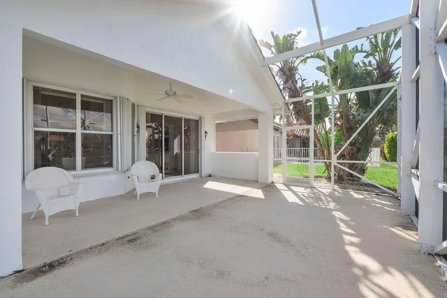 an aerial view of a house with a garden and plants