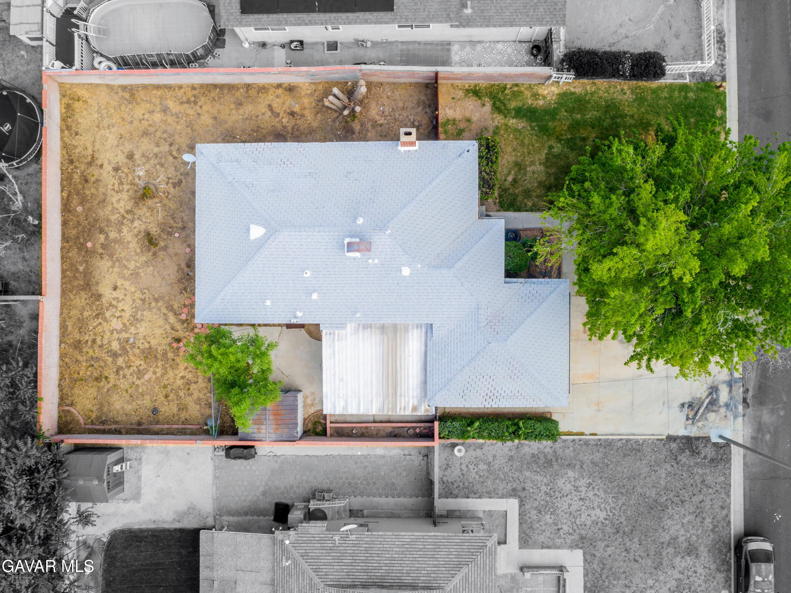 44265 Foxton Avenue Lancaster, CA 93535 - Photo 6 of 20 an aerial view of a house with a yard and a fountain