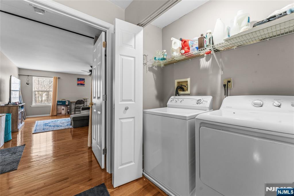 123 Butternut Drive Wayne, NJ 07470 - Photo 17 of 23 a view of storage and utility room with washer and dryer