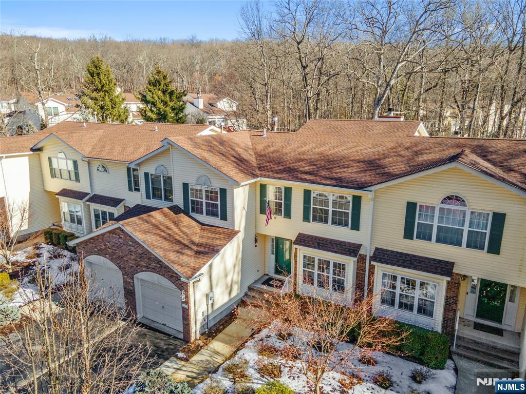 123 Butternut Drive Wayne, NJ 07470 - Photo 2 of 23 a front view of a house with a yard and large tree