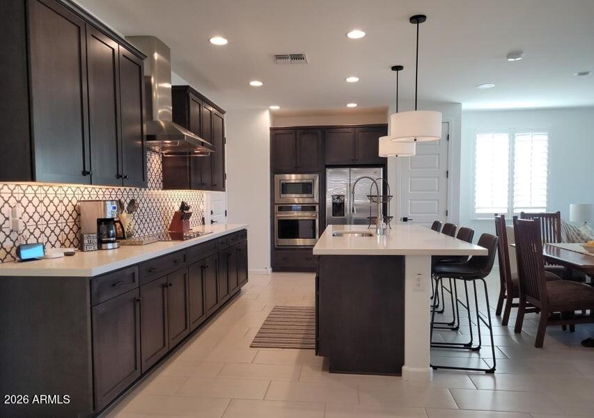4540 Jackpot Road Wickenburg, AZ 85390 - Photo 3 of 13 a large kitchen with a large counter top appliances and cabinets