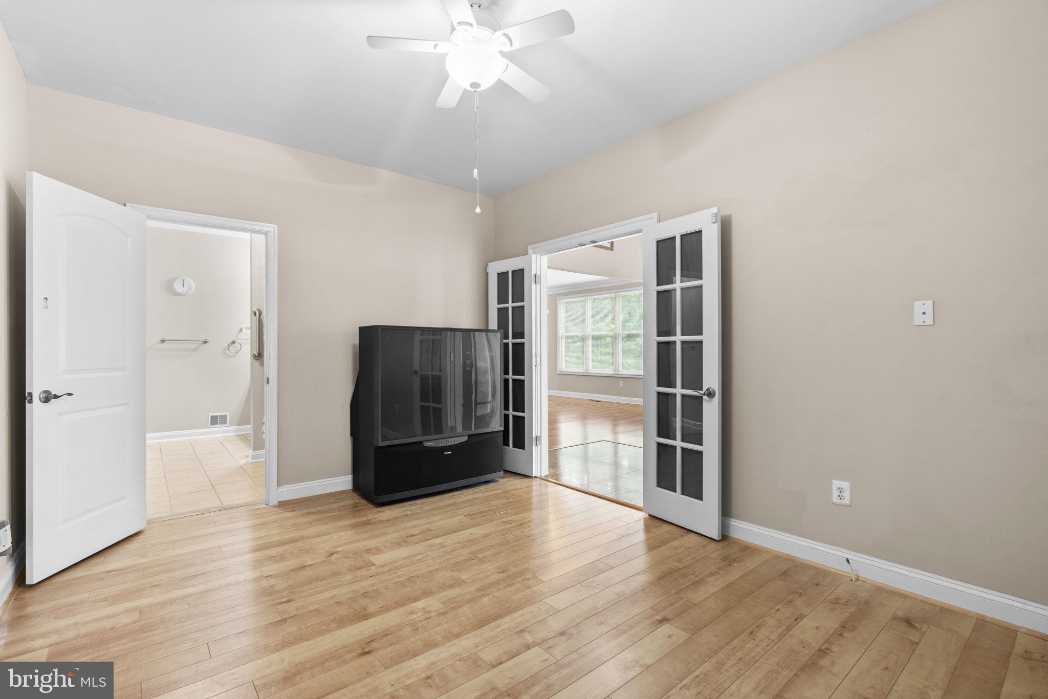 8024 Solley Road Glen Burnie, MD 21060 - Photo 44 of 83 wooden floor in an empty room with a window
