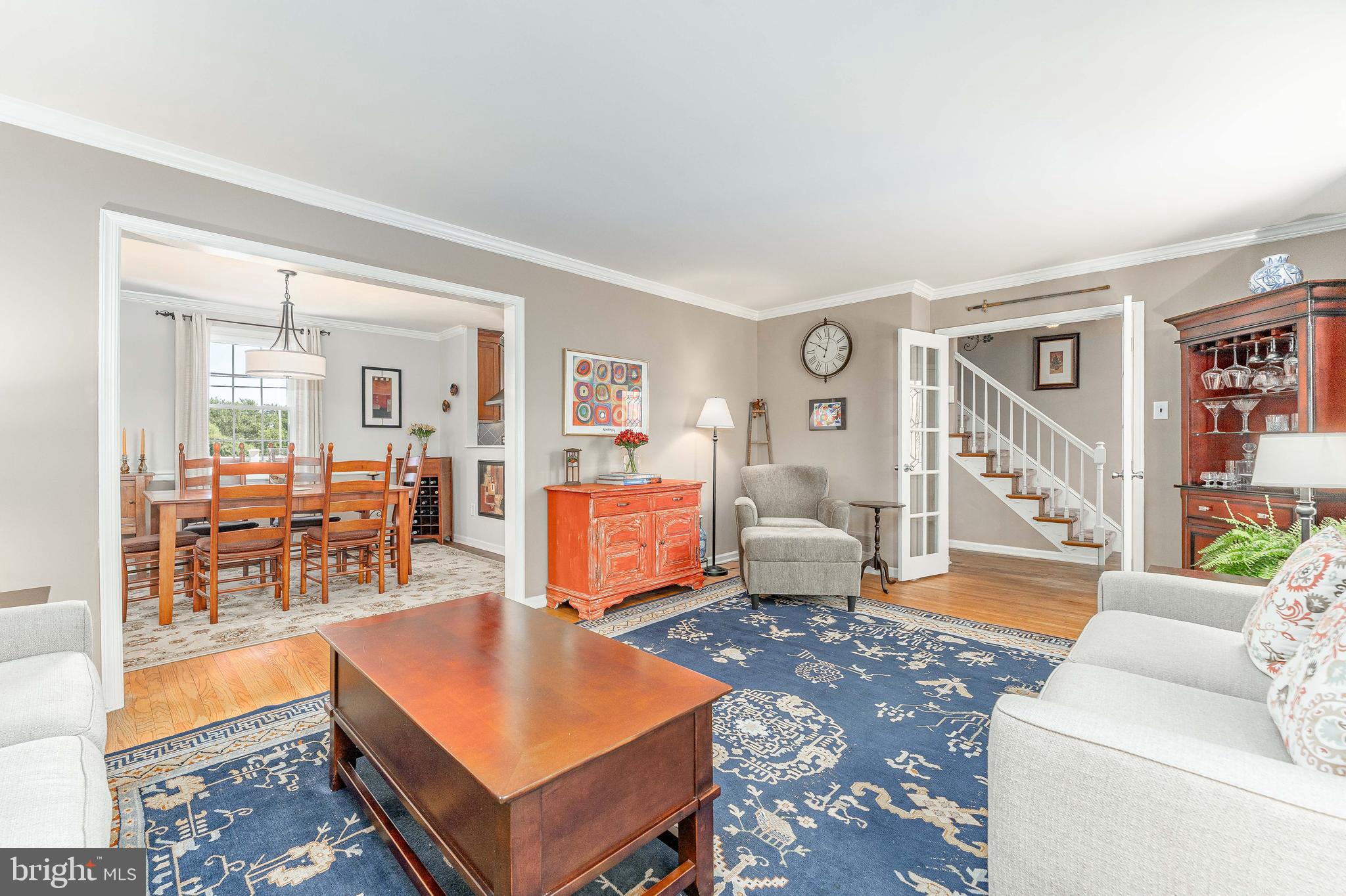 84 North Spring Lane Phoenixville, PA 19460 - Photo 8 of 51 a living room with furniture a wooden floor and next to a window