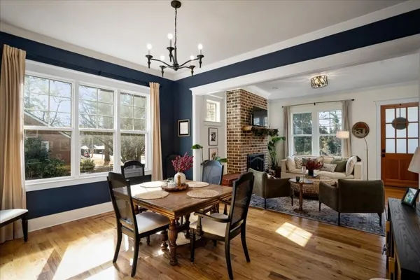 a kitchen with stainless steel appliances granite countertop a refrigerator a stove and a refrigerator