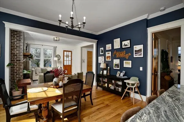 a kitchen with stainless steel appliances granite countertop a refrigerator stove and sink