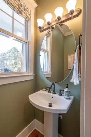 a living room with furniture and windows