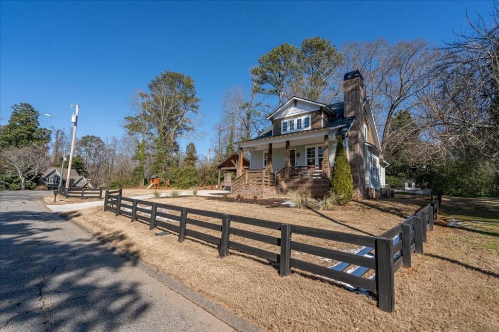 435 Walton Street Monroe, GA 30655 - Photo 50 of 55 a view of a park with iron fence