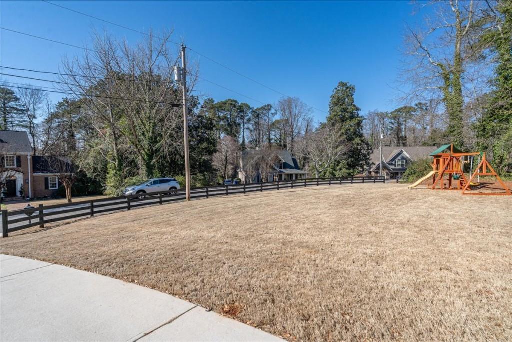 435 Walton Street Monroe, GA 30655 - Photo 6 of 55 a view of a backyard of the house