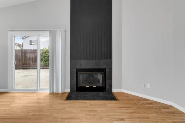 a living room with a fireplace