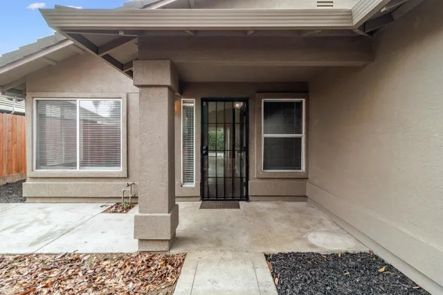 a view of a door and a window