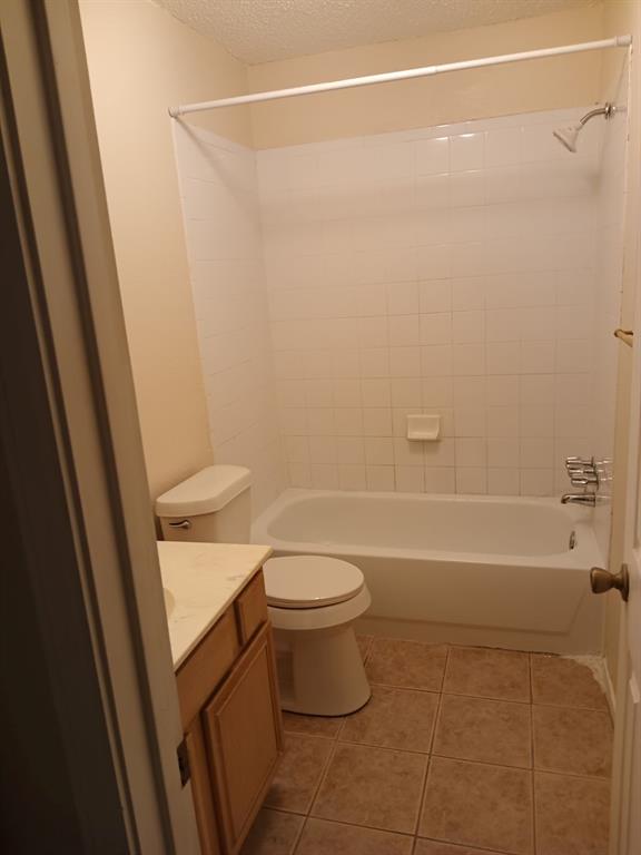113 South Summit Street Red Oak, TX 75154 - Photo 2 of 4 a bathroom with a toilet and a shower