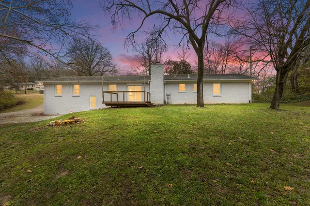 front view of a house with a big yard
