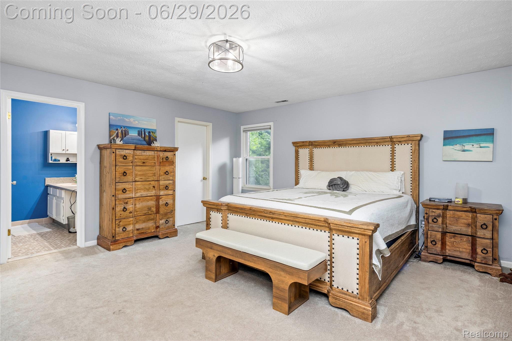 6085 Worlington Road Bloomfield Hills, MI 48301 - Photo 35 of 75 Spacious 1st Floor Primary Bedroom featuring light grey wall paint, plush carpeting, and a contemporary ceiling light fixture