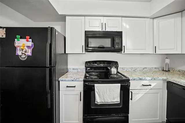 a view of utility room and bedroom
