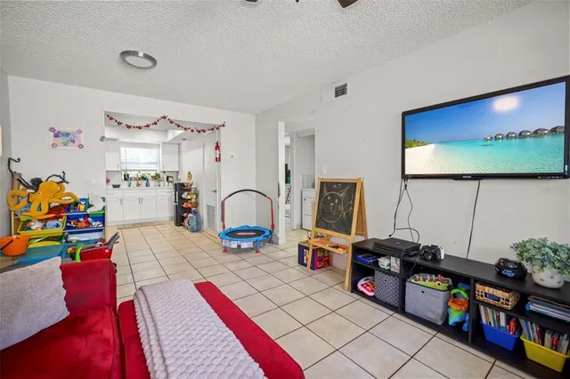 a storage room with lots of furniture and toys