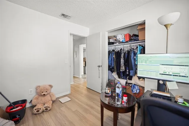 a kitchen with a sink stove and microwave