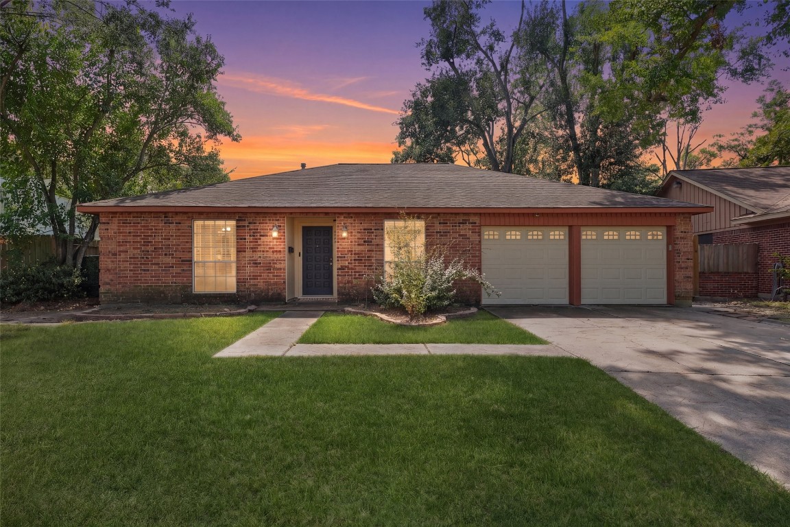 5907 Peg Street Houston, TX 77092 - Photo 1 of 21 a view of outdoor space yard and front view of a house