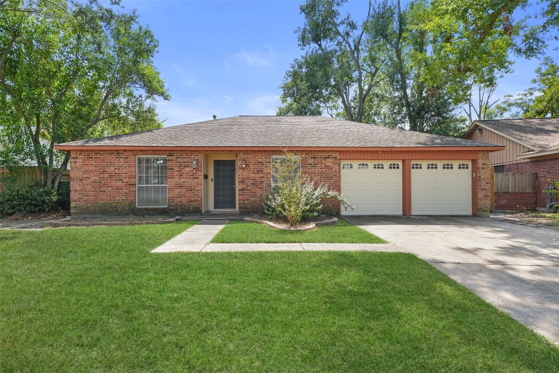 5907 Peg Street Houston, TX 77092 - Photo 21 of 21 a view of outdoor space yard and front view of a house