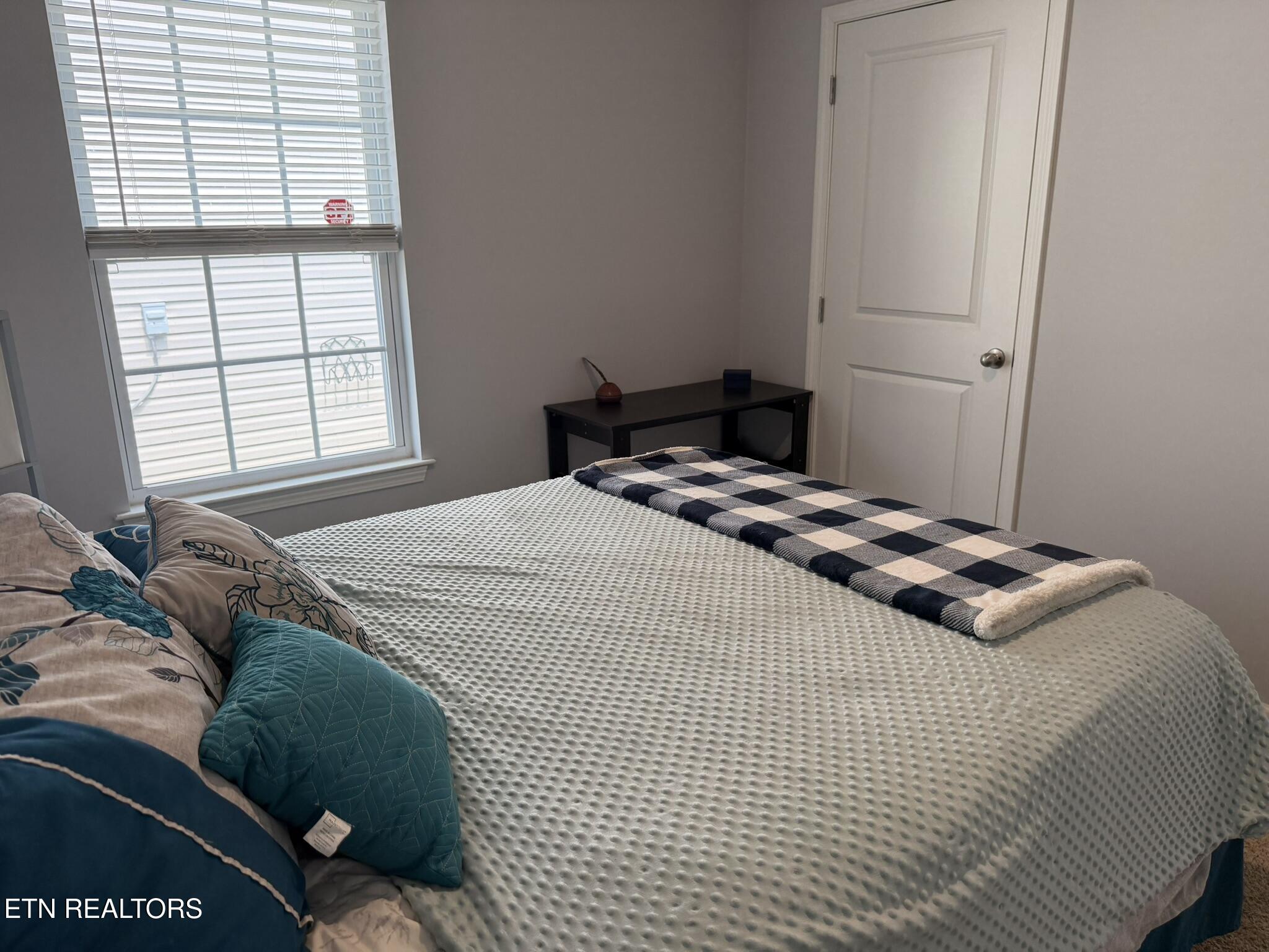 9443 Avian Forest Lane Heiskell, TN 37754 - Photo 9 of 28 Bedroom 2 to closet