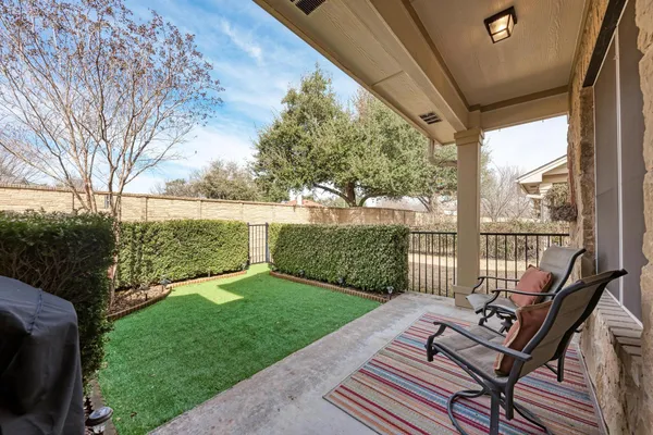 a view of a couches in backyard of house