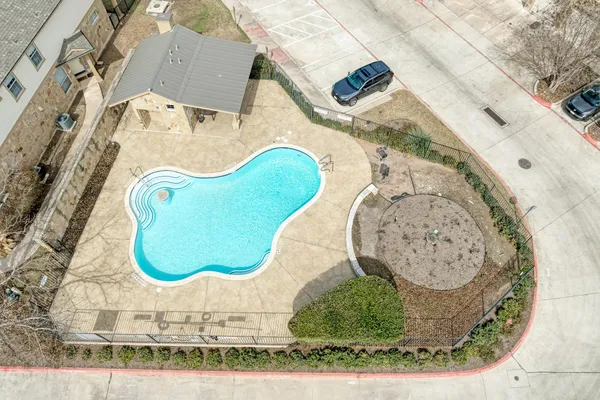 an aerial view of a swimming pool