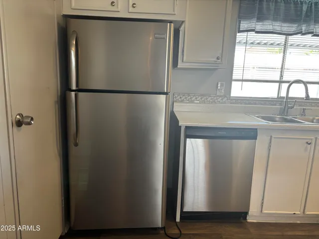 a utility room with washer and dryer